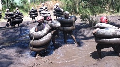 Scouts on a muddy adventure challenge